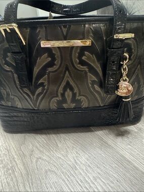 Brahmin Black Embossed Leather Satchel with Gold Accents and Tassel Charm